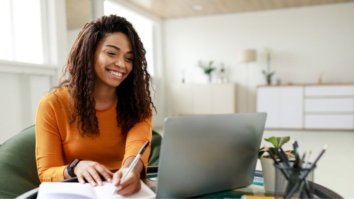 woman studying on laptop