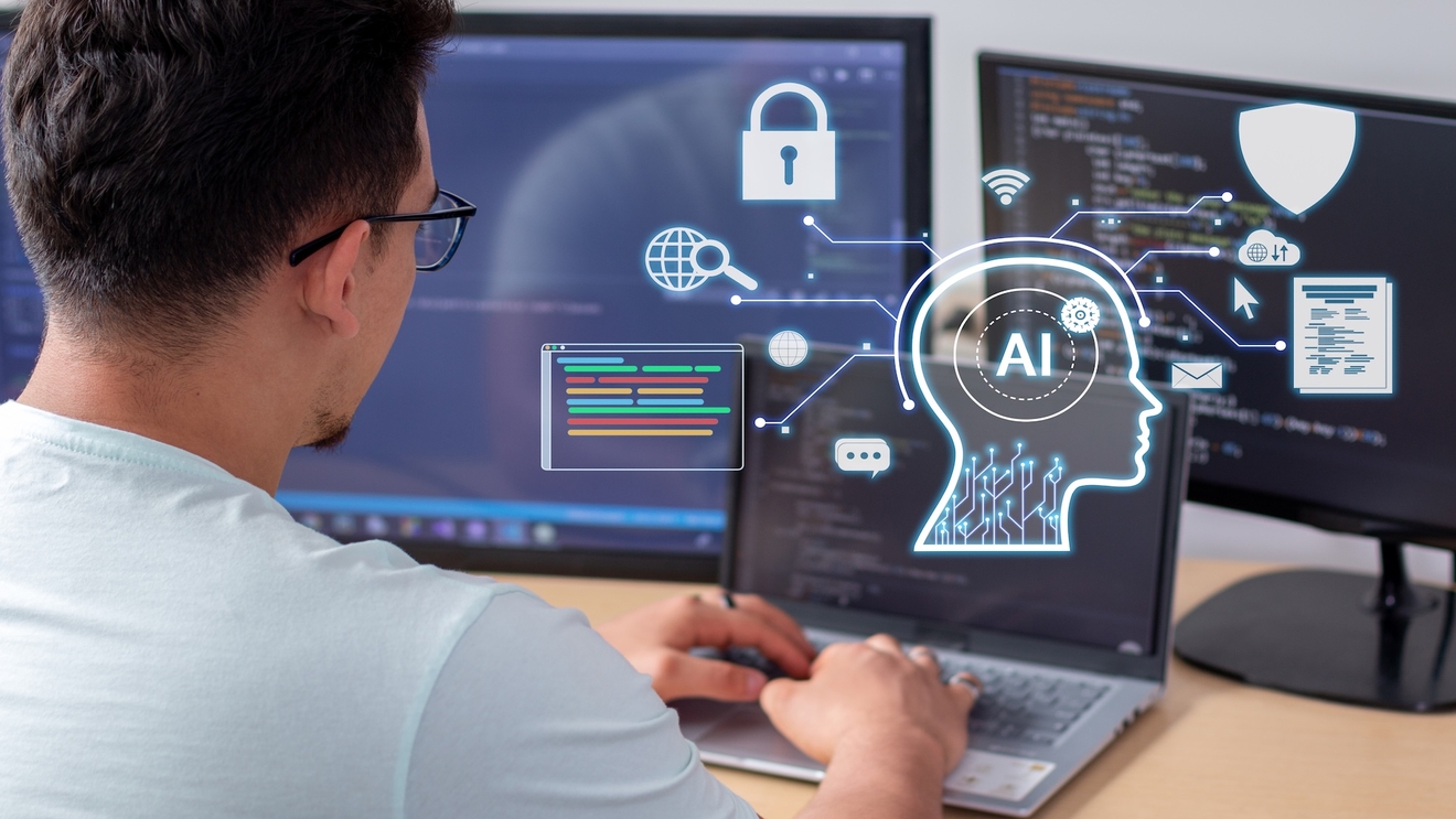 man typing on laptop with floating AI and security graphics, representing AI security specialists