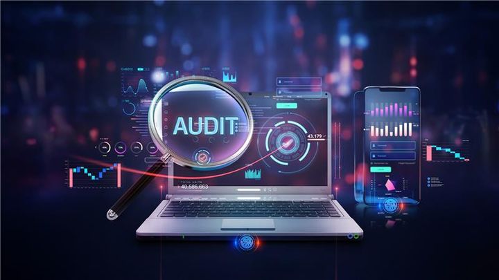 laptop floating with audit icon in neon glow colors