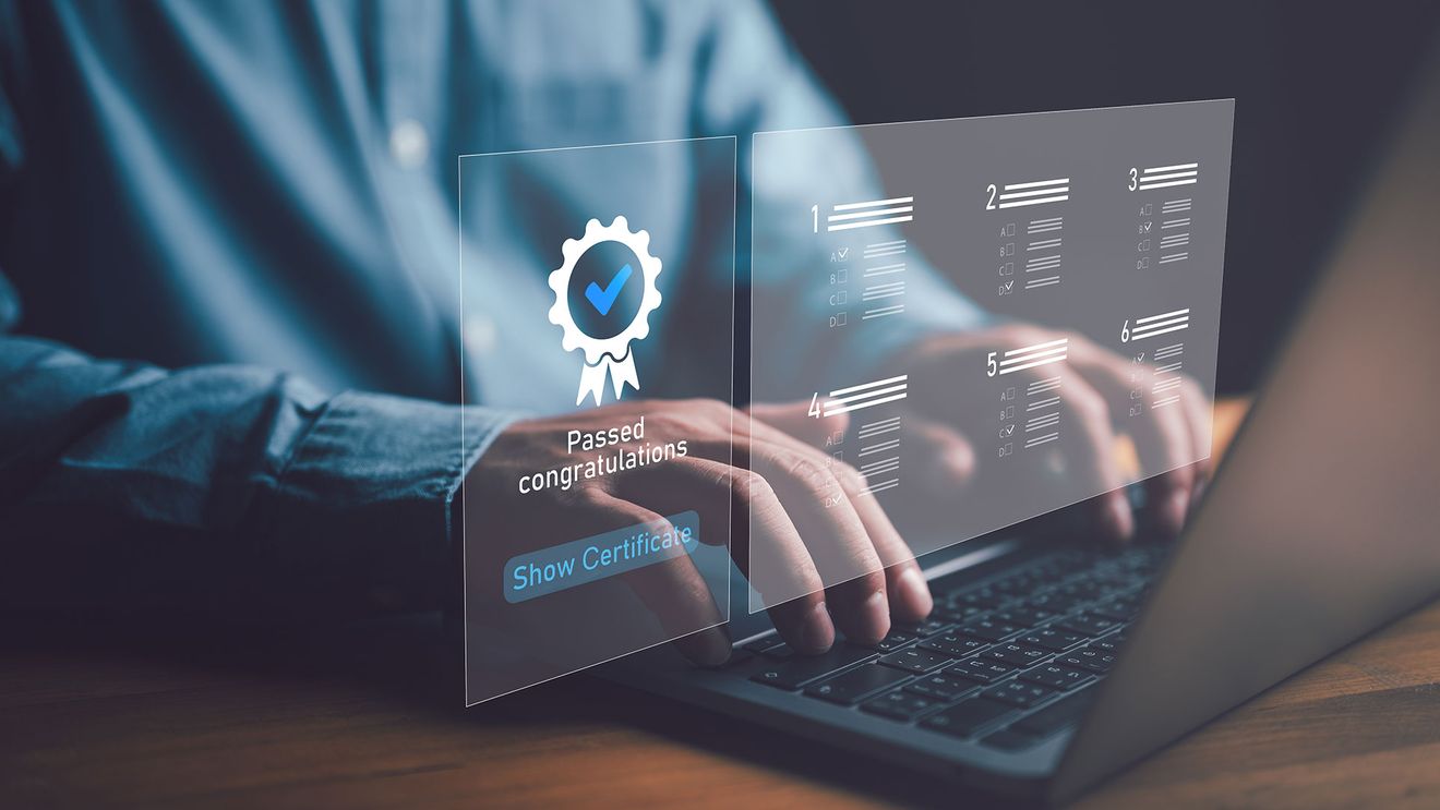 Person viewing a digital certification on a laptop 