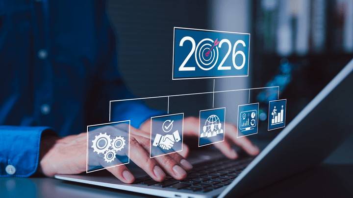 laptop with icons floating over and 2026 on top