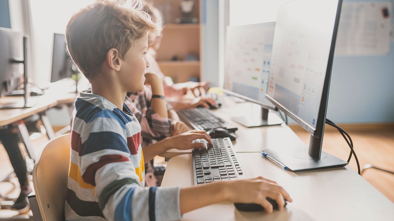 Children learning on a home computer